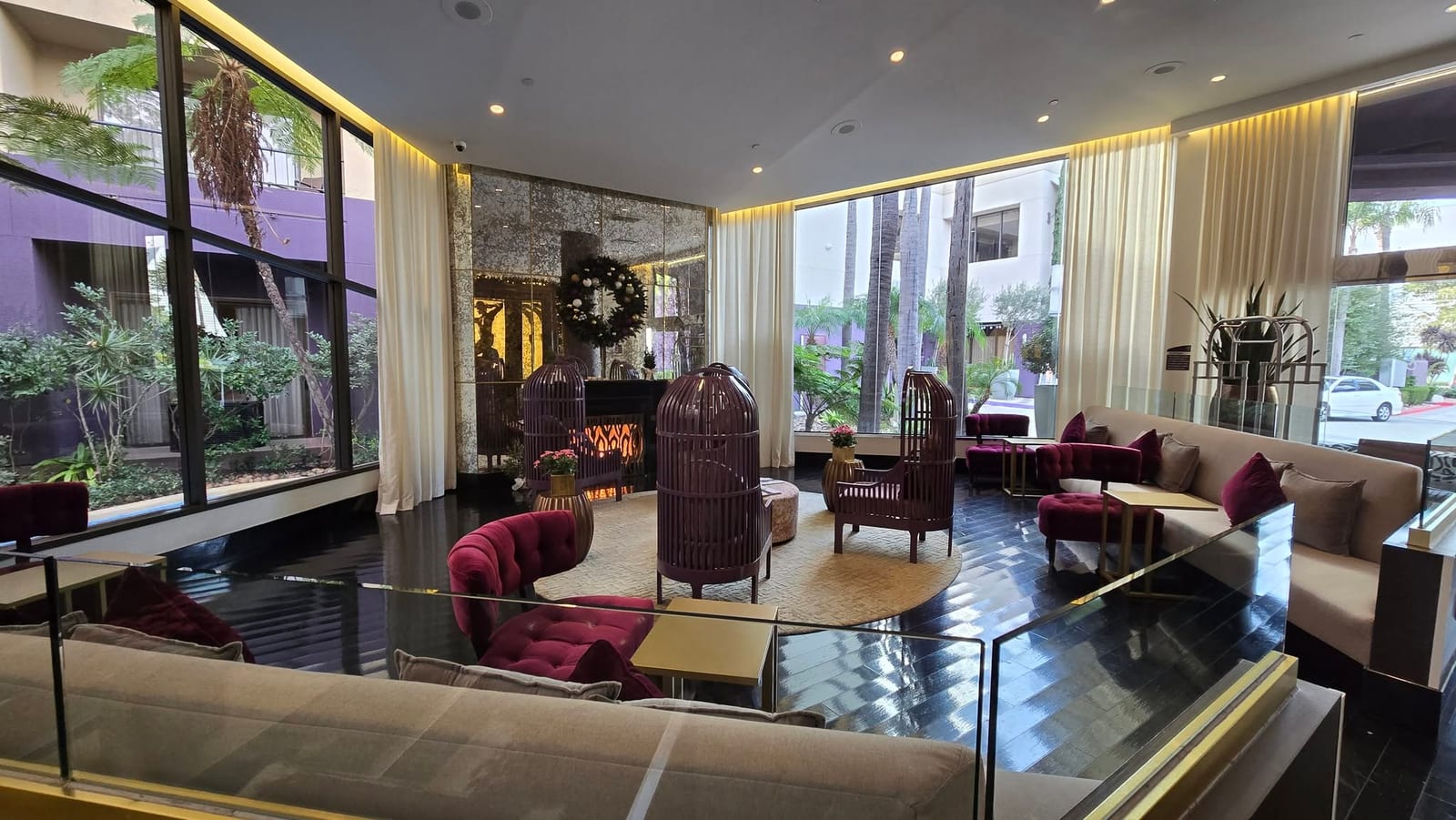 Avenue of the Arts Costa Mesa Glamour Lobby Lounge with Fireplace and Birdcage Chairs