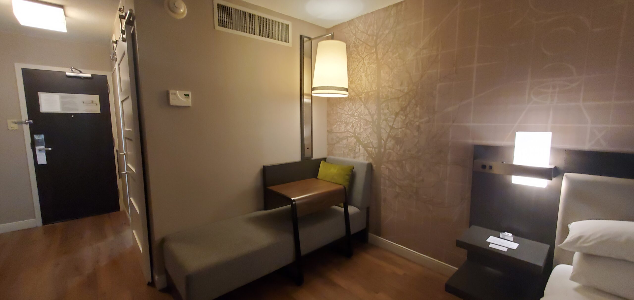 Bethesda Marriott King room chaise lounge and C-table workstation