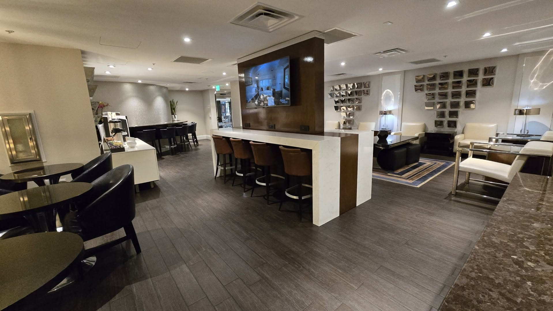 M Club Lounge communal work island and seating overview