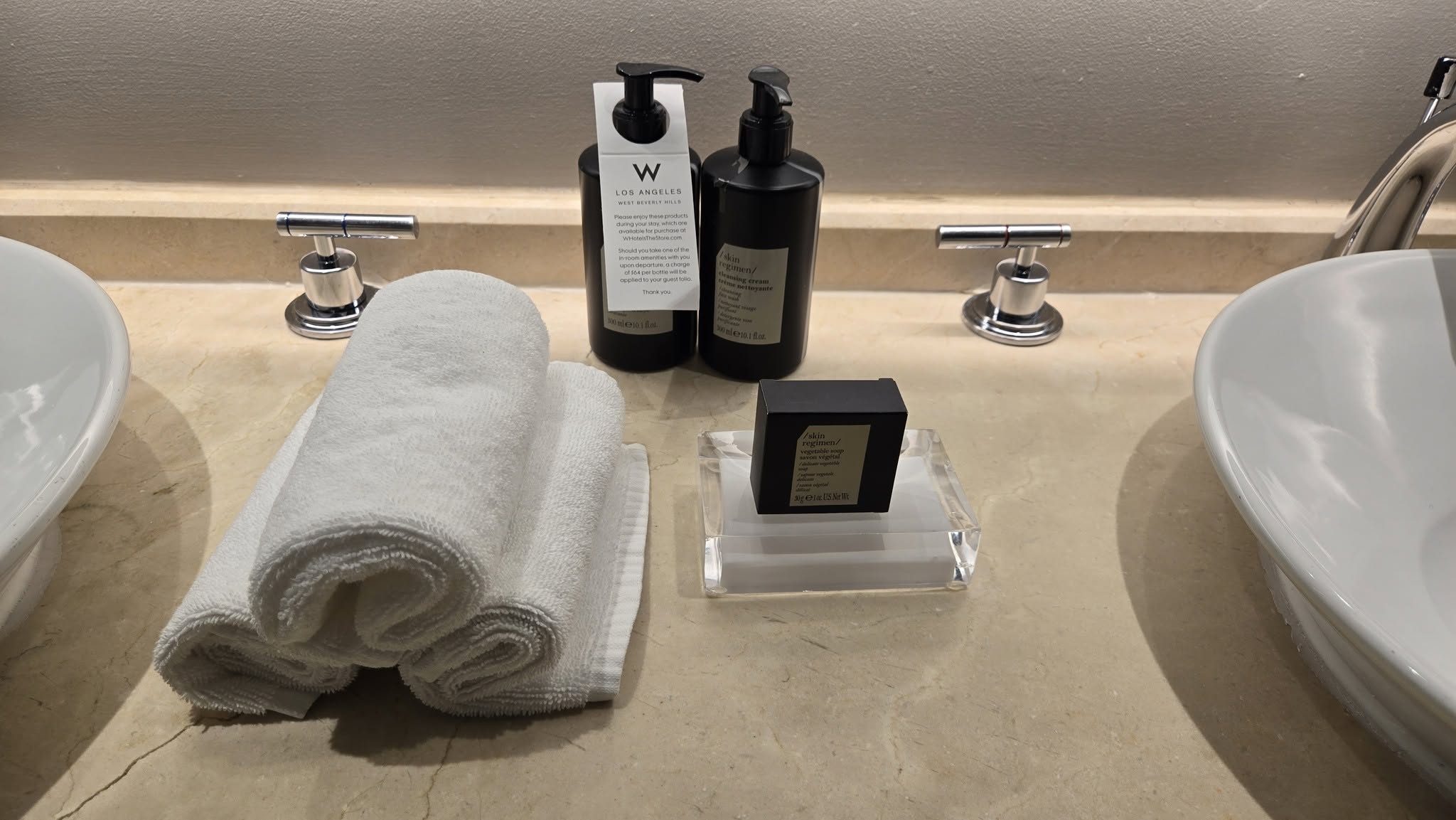 Bathroom vanity sink with luxury /skin regimen/ apothecary toiletries