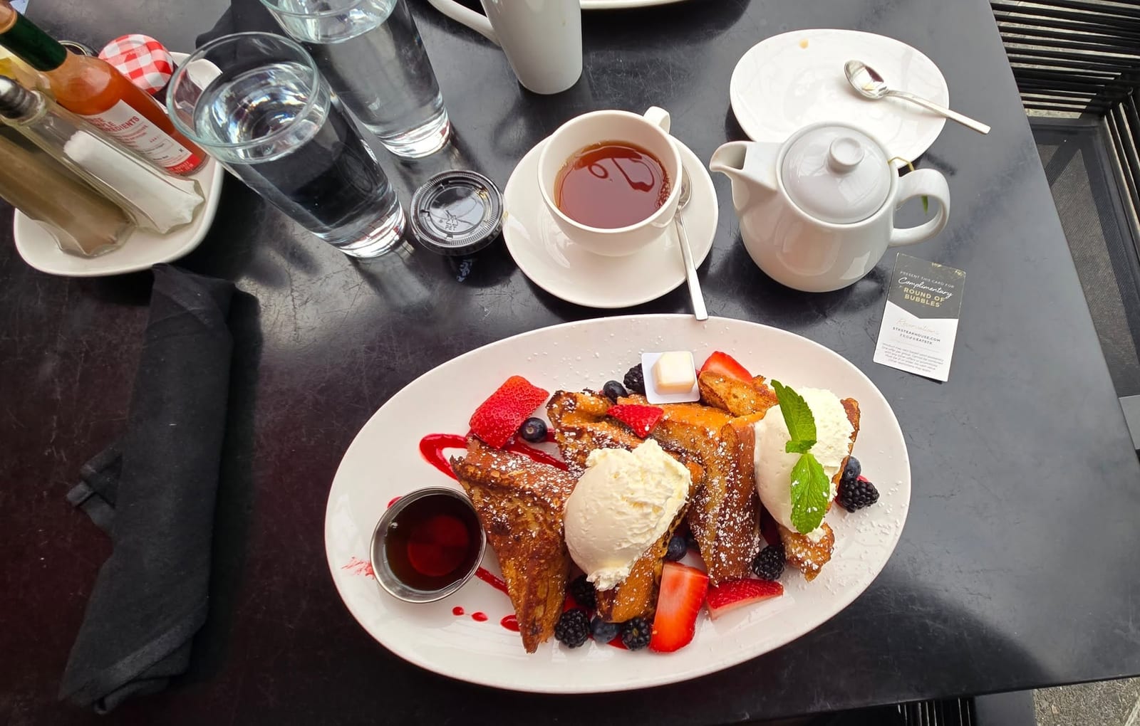 Golden brioche French toast served with fresh seasonal berries and whipped mascarpone