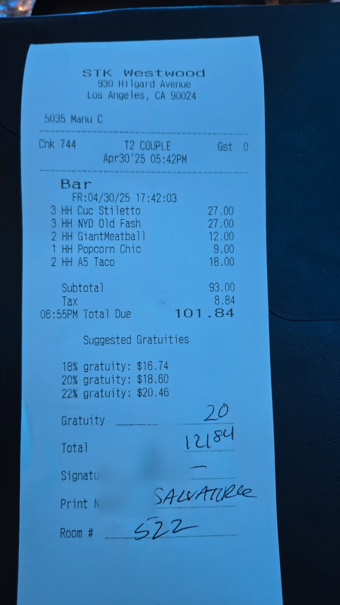 Living Room bar signed happy hour receipt for April 30 2025 totaling $121.84 billed to Room 522